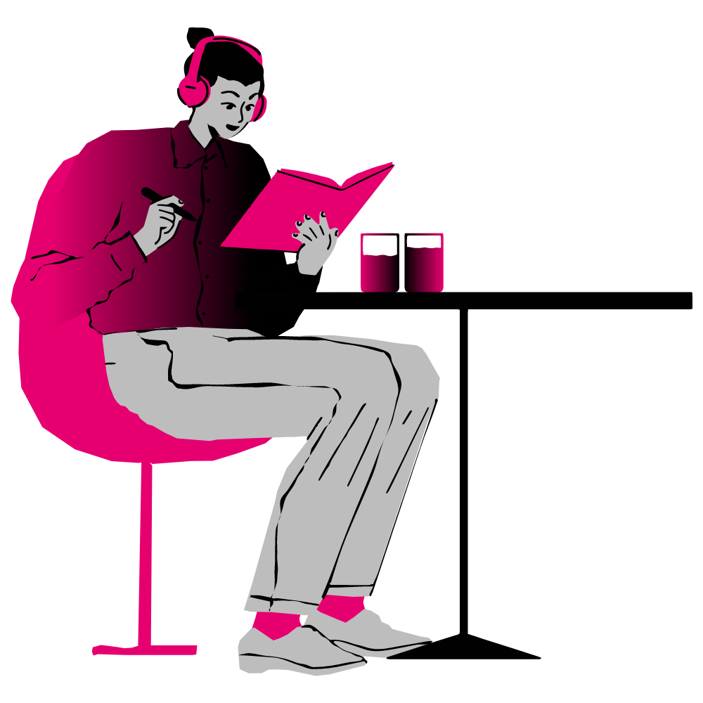 person listening to headphones and reading