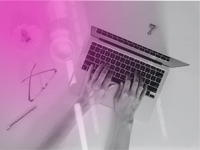 person typing on a laptop