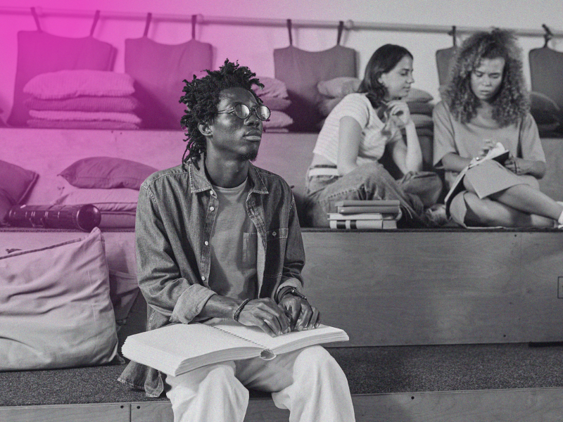person using braille in a classroom
